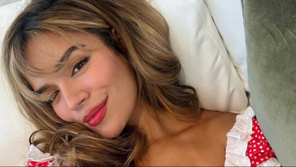 Bajo el lujo Louis Vuitton de la cabeza a los pies: Karol G se viste con jeans baggy y chaleco en un look chic