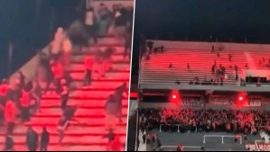 Una persona cayó al vacío: Las brutales imágenes de los incidentes en duelo de la U con Independiente