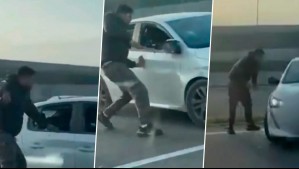 Pelea vial terminó con violento desenlace: Hombre destruyó a martillazos vehículo en Acceso Sur