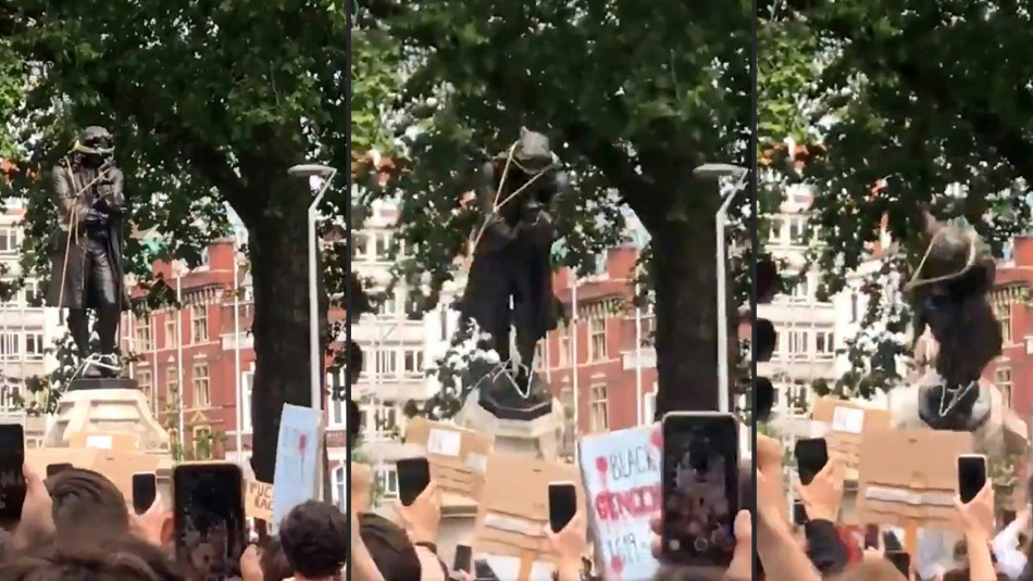 Manifestantes derriban estatua de esclavista inglés del siglo XVII Videos registran cómo manifestantes en Inglaterra tiraron al agua estatua de esclavista del siglo XVII