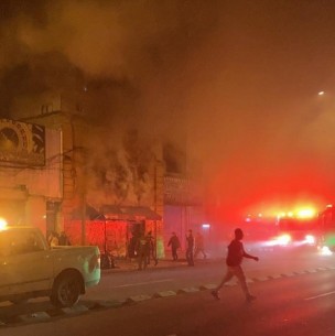 Incendio en local comercial deja a siete adultos y un lactante damnificados Incendio en local comercial deja a siete adultos y un lactante damnificados
