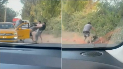 'Está agonizando, llamen a Carabineros': Video muestra golpiza de padre e hijo a conductor