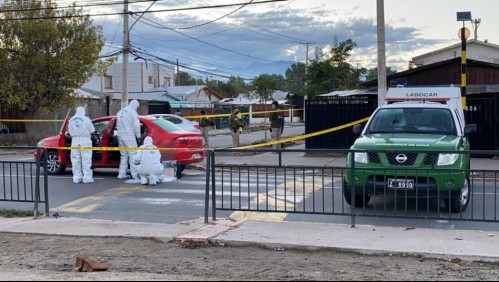 Funcionario de la PDI balea a dos sujetos tras sufrir encerrona: uno es menor de edad