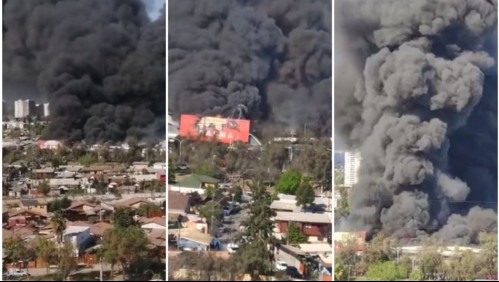 Incendio afecta a fábrica en la comuna de Macul: Columna de humo es visible desde larga distancia