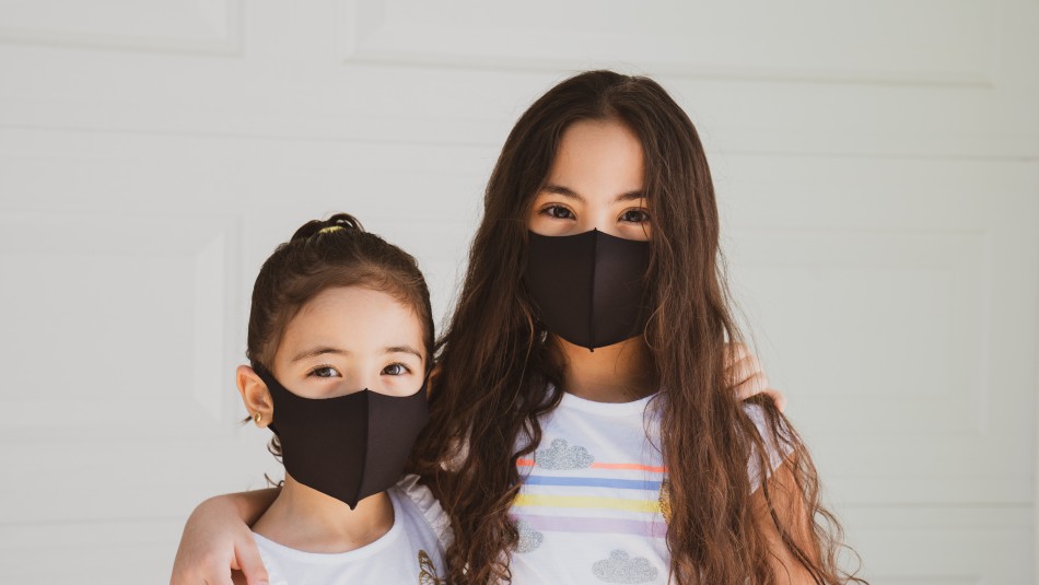 respuesta-al-covid-ninos respuesta al covid niños. Niñas con mascarilla