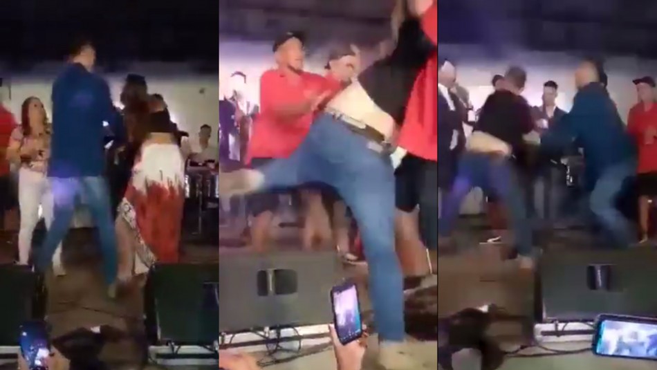 Una fan intenta besar a cantante durante un concierto y su novio se sube al escenario para golpearlo