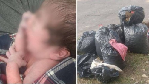 Envuelta en trapos y desnuda: Rescatan a bebé abandonada en un basurero poco antes de que pasara el camión recolector