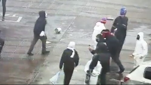 Estaba con overol blanco: Juzgado dejó con 'arresto domiciliario total' a estudiante detenido esta mañana