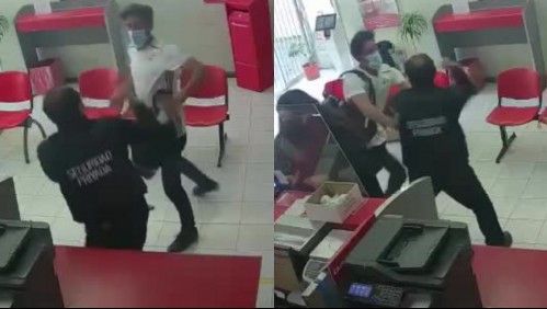 Se enfrentó a golpes con sujeto armado: Video muestra a guardia de seguridad que frustró robo a Correos de Chile