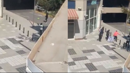 Efectuando disparos: Diez sujetos asaltaron una tienda de celulares en el Mall Plaza Oeste de Cerrillos