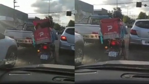 'No tengo con quién dejarlo': La historia del repartidor que lleva a su hijo en la caja de delivery de su moto
