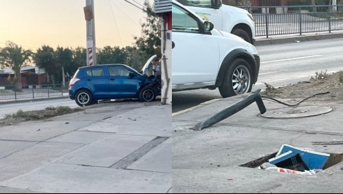 Vehículo impacta con el frontis de una casa y un poste de alumbrado en Estación Central