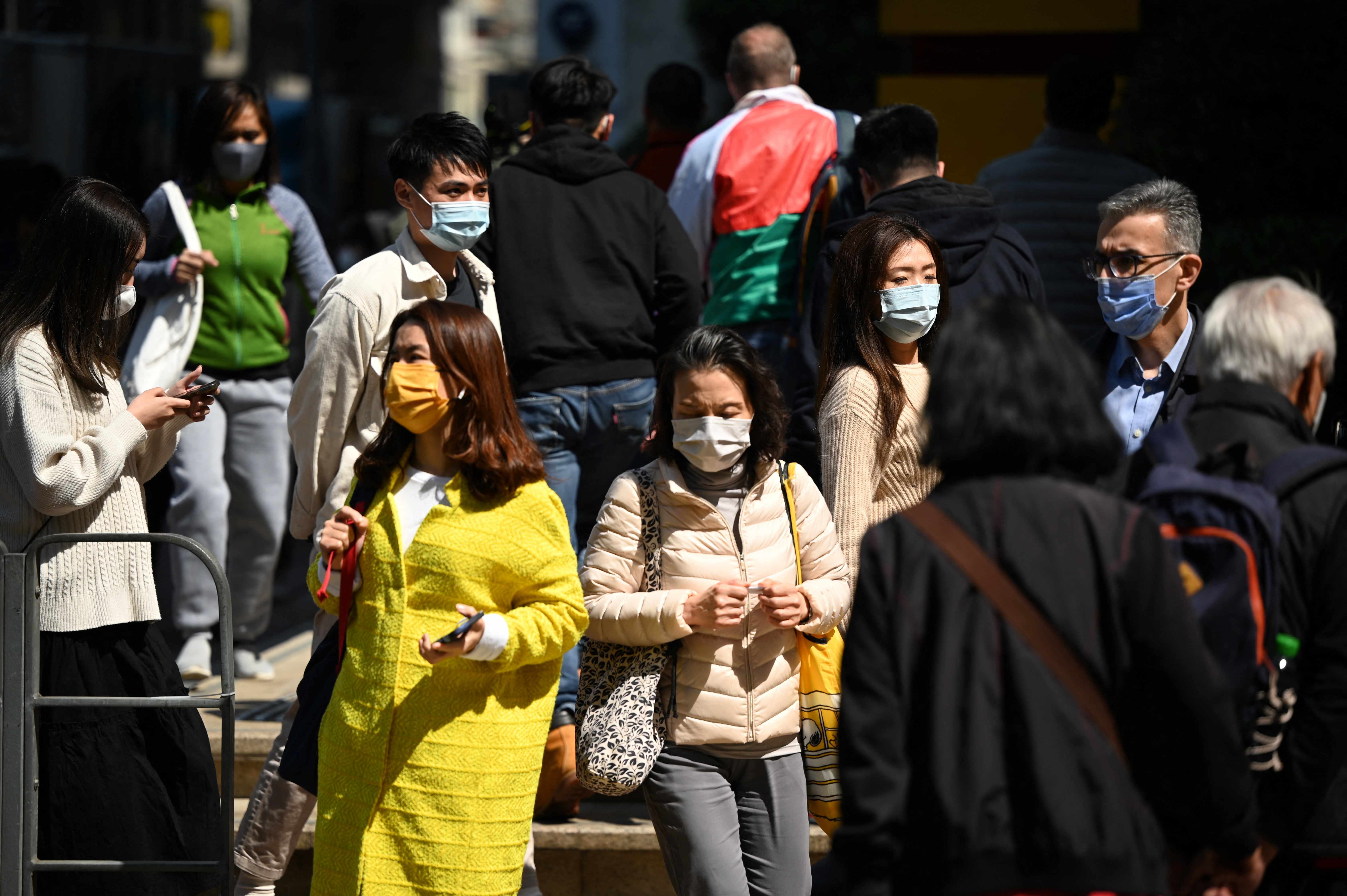 Personas con mascarilla en China / Archivo AFP