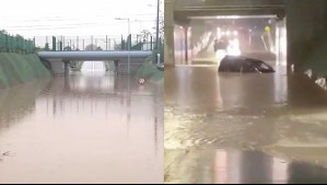 Vehículo queda atrapado en paso bajo nivel inundado en Buin: Profundidad del agua se acerca a los dos metros