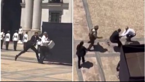Con maletín en mano: Detienen a hombre tras saltar perímetro de seguridad de La Moneda en pleno homenaje a Piñera