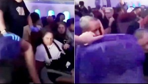 Video muestra minutos de pánico durante emergencia en vuelo Sidney-Santiago que dejó a pasajeros heridos