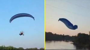 Video captó el momento: Parapentista choca con cables de alta tensión, cae al río y sobrevive