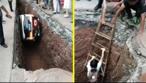 'Robotaxi' autónomo cayó a un pozo en una construcción en China: Pasajera fue rescatada con escalera
