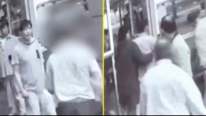 Video muestra agresión a conserjes en edificio del centro de Santiago: Residente pateó a uno de ellos y lo botó al suelo