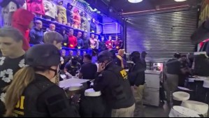 Operativo en barrio Meiggs: Incautan ropa falsificada por más de $300 millones y detienen a 11 personas