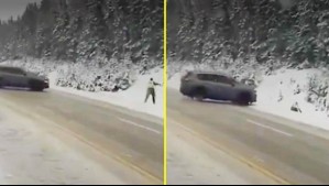 Se salvó de milagro: Policía casi es atropellado por auto que perdió el control en la nieve