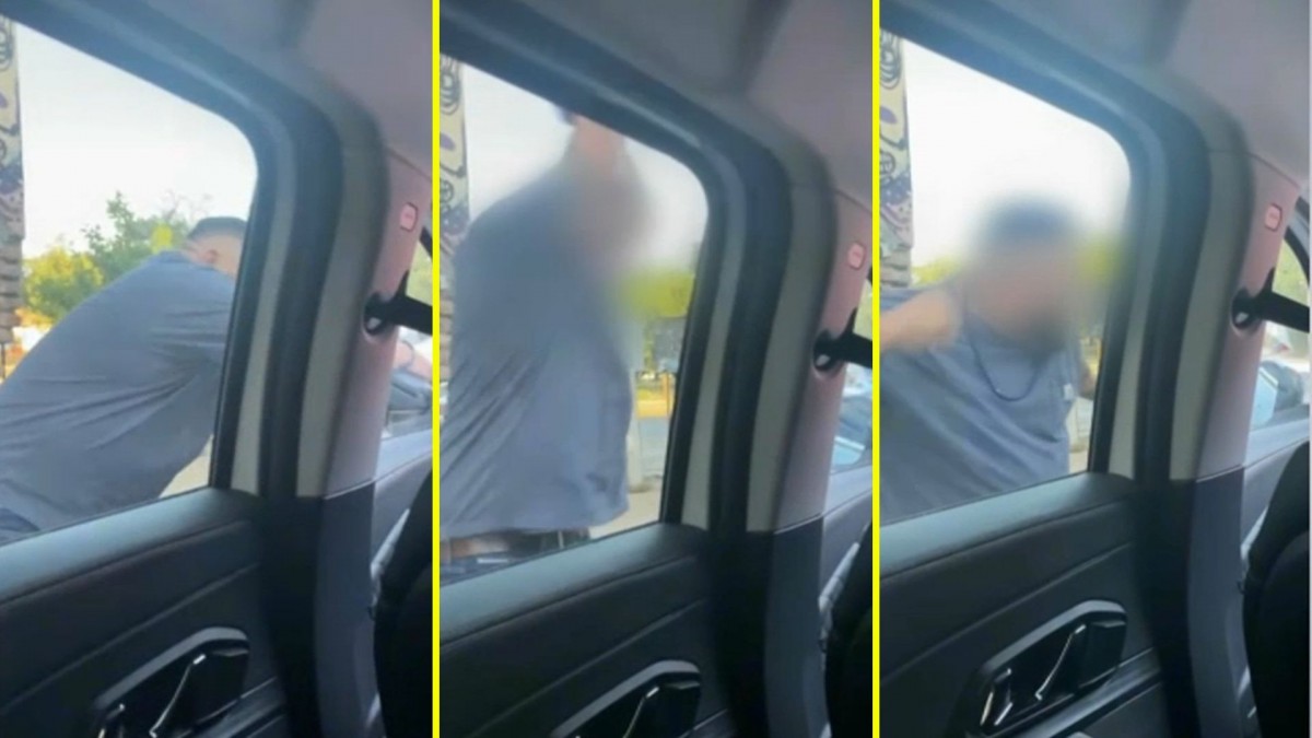 Graban violenta reacción de conductor por adelantamiento: Se bajó de su auto y destrozó parte del vehículo de una mujer