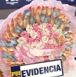 Un insólito ramo hecho de billetes que envió un delincuente a su polola fue uno de los artículos incautados en un importante operativo que terminó con la detención de una banda de falsos policías que se dedicada a las estafas.