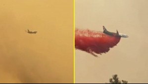 Avión descarga material químico que ayuda a combatir el fuego y se gana los aplausos de los ciudadanos en Palomares
