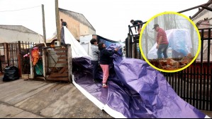 'No sabemos cómo va a ser': Damnificados por incendios resguardan sus pertenencias ante pronóstico de lluvia