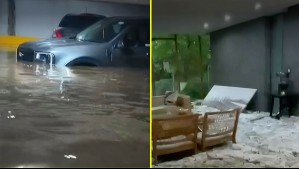 Lluvias en Santiago: Estacionamientos subterráneos se inundan en Ñuñoa y granizos se acumulan en edificio en Providencia