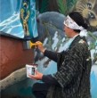 Un particular trabajo realizó en Puerto Montt el japonés Sosho Sahara, de 32 años, quien recorre el mundo lustrando zapatos y que esta vez ayudó a restaurar la escultura \\\'Sentados frente al mar\\\', conocida como la estatua de los enamorados.